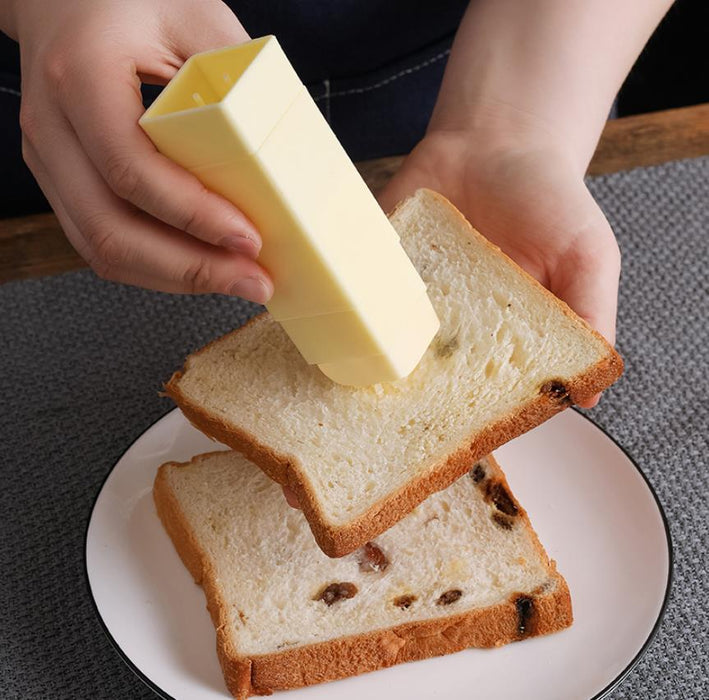 Hand Holding Rotary Roll Out Butter Spreader Kitchen Gadgets Baking Butter Spreader - eZthings USA WE SORT ALL THE CRAZIEST GADGETS, GIZMOS, TOYS & TECHNOLOGY, SO YOU DON'T HAVE TO.