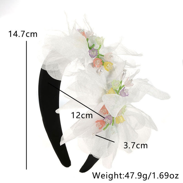 Fashionable handmade fabric crystal flower headband - eZthings USA WE SORT ALL THE CRAZIEST GADGETS, GIZMOS, TOYS & TECHNOLOGY, SO YOU DON'T HAVE TO.