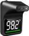Black digital thermometer with temperature display on a white background