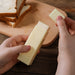 Hand Holding Rotary Roll Out Butter Spreader Kitchen Gadgets Baking Butter Spreader - eZthings USA WE SORT ALL THE CRAZIEST GADGETS, GIZMOS, TOYS & TECHNOLOGY, SO YOU DON'T HAVE TO.