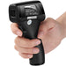 Hand holding a black infrared thermometer with visible branding on a white background